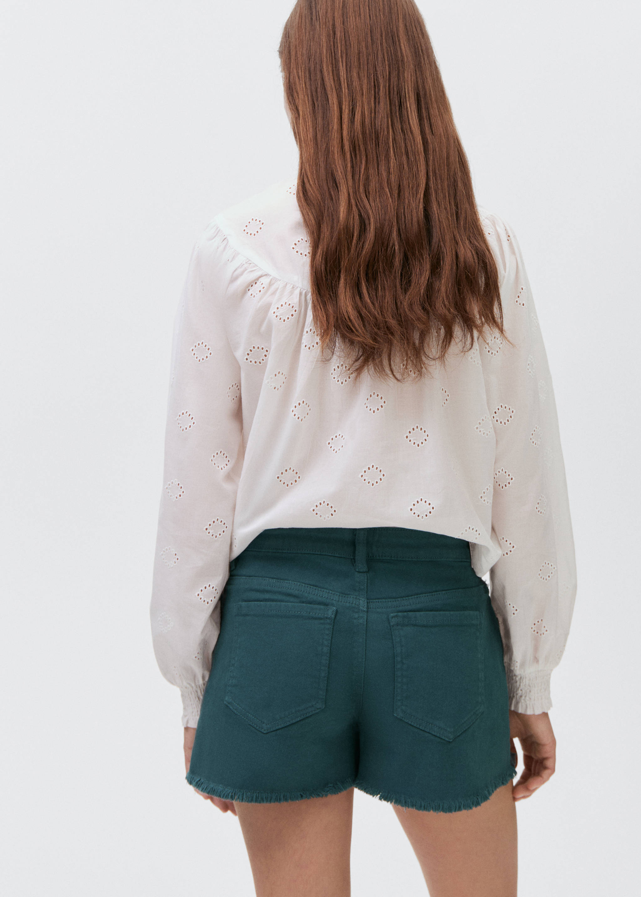 Denim shorts with frayed hem - Reverse of the article