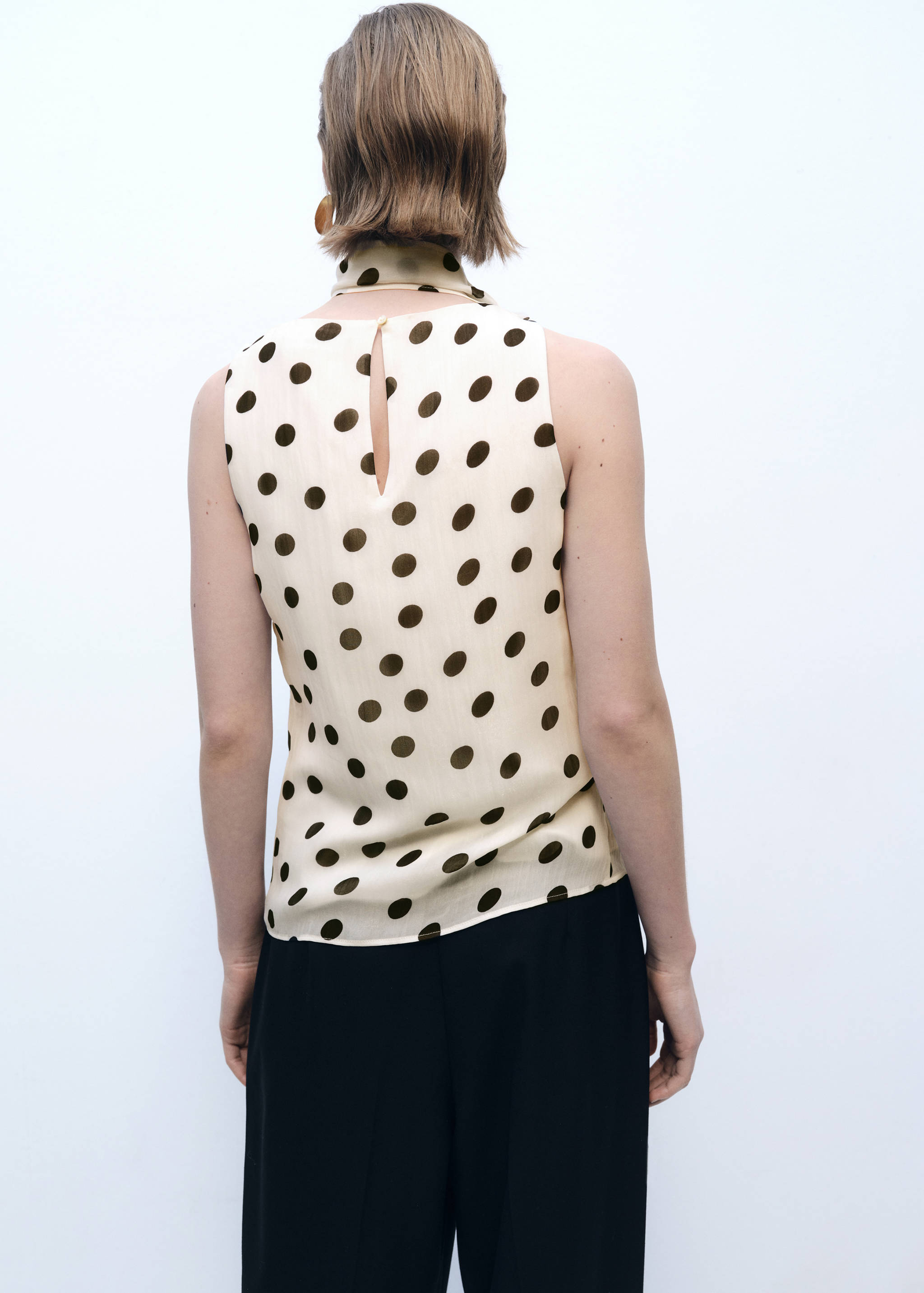 Polka-dot wrap-neck blouse - Reverse of the article