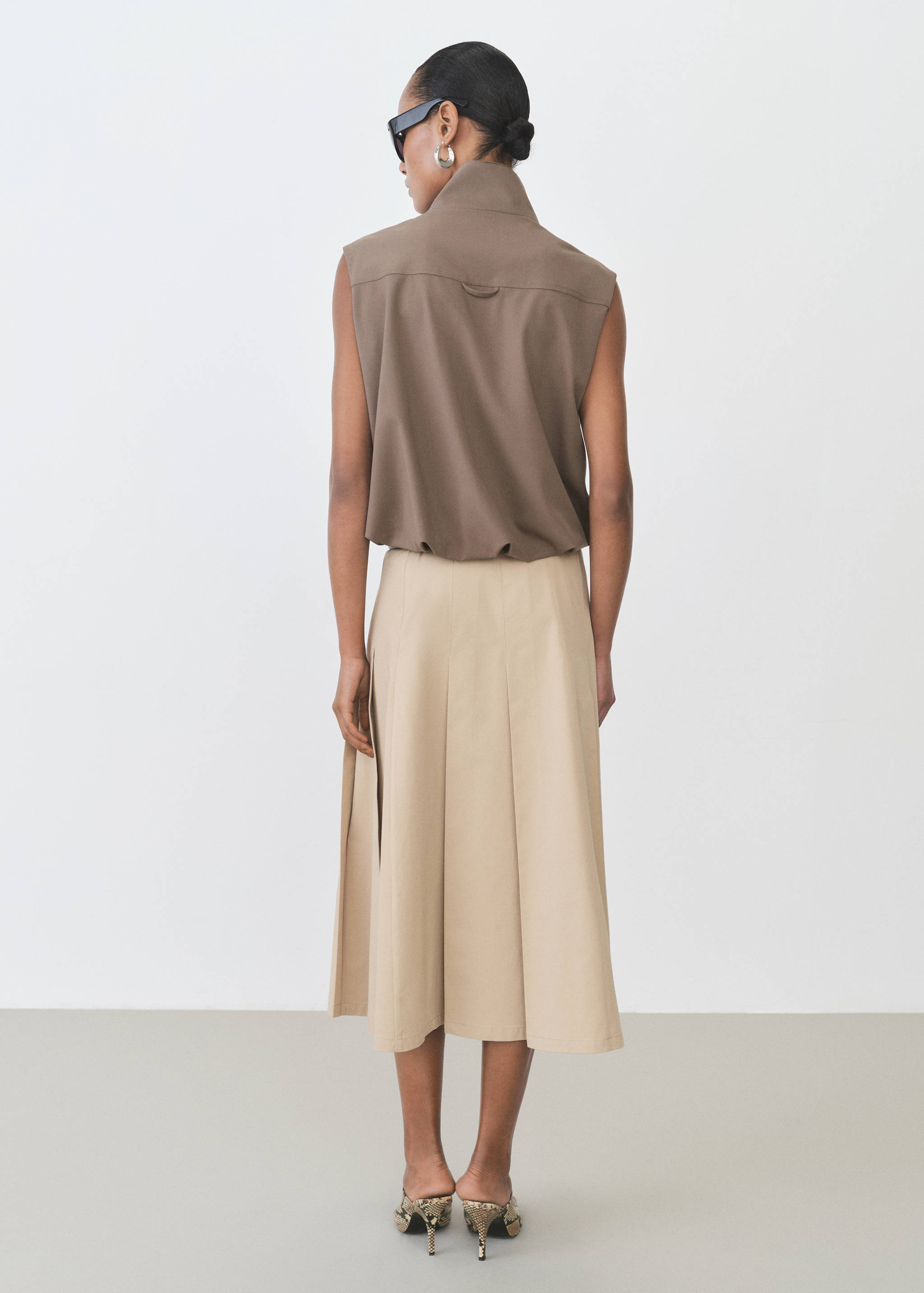 Klockad kjol veckad detalj - Artikelns baksida