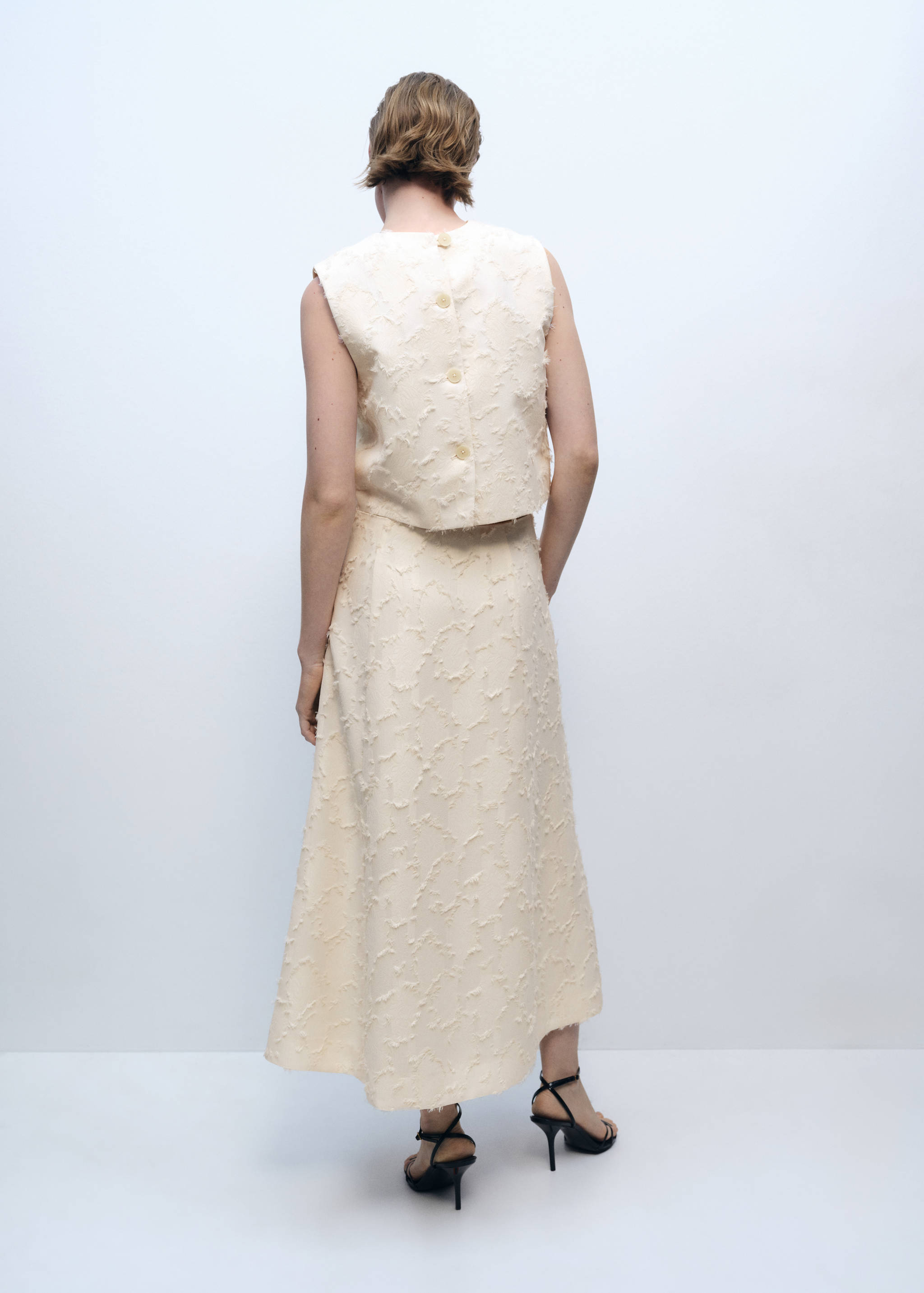 Saia evasé com textura - Verso do artigo