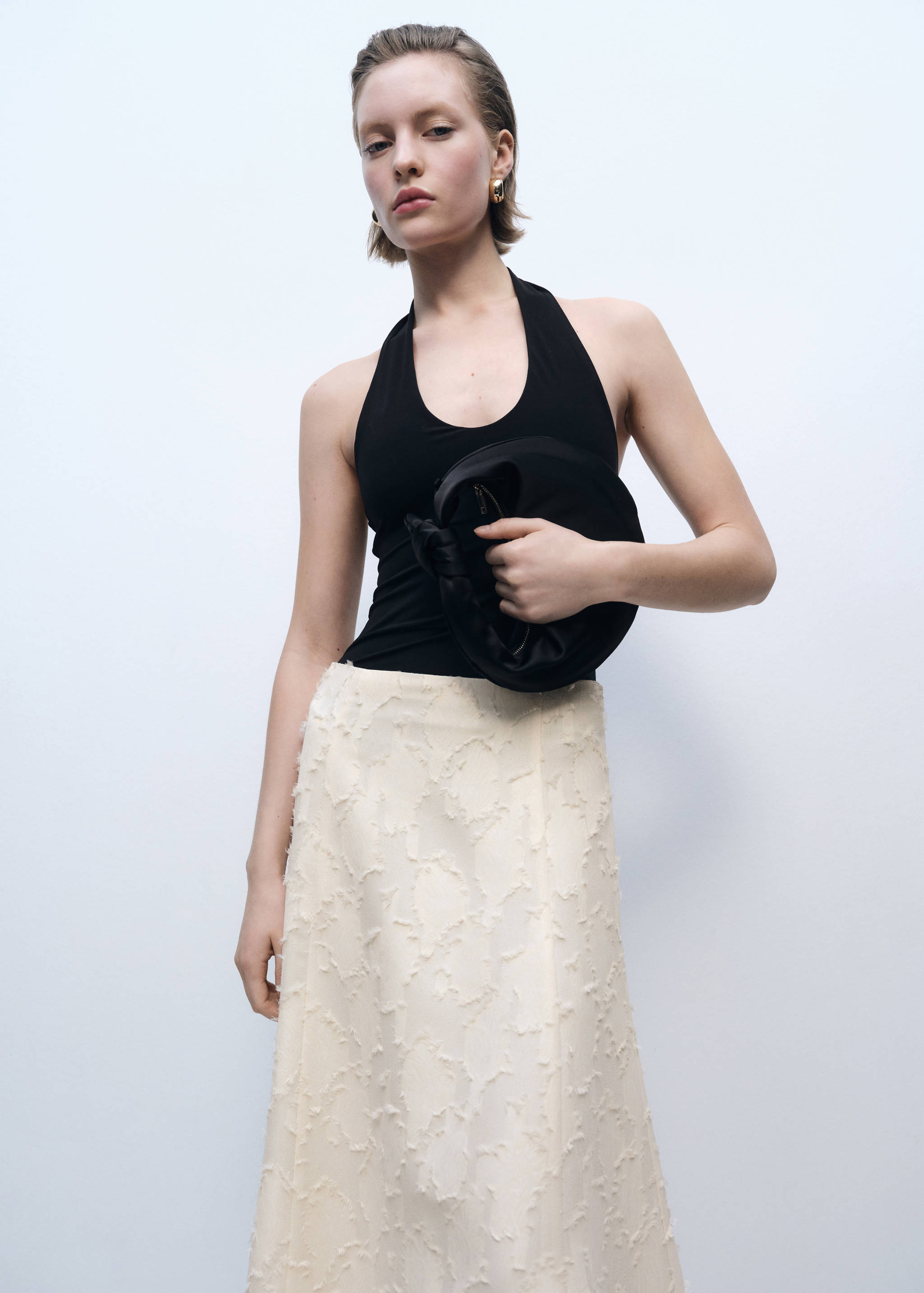 Saia evasé com textura - Pormenor do artigo 2