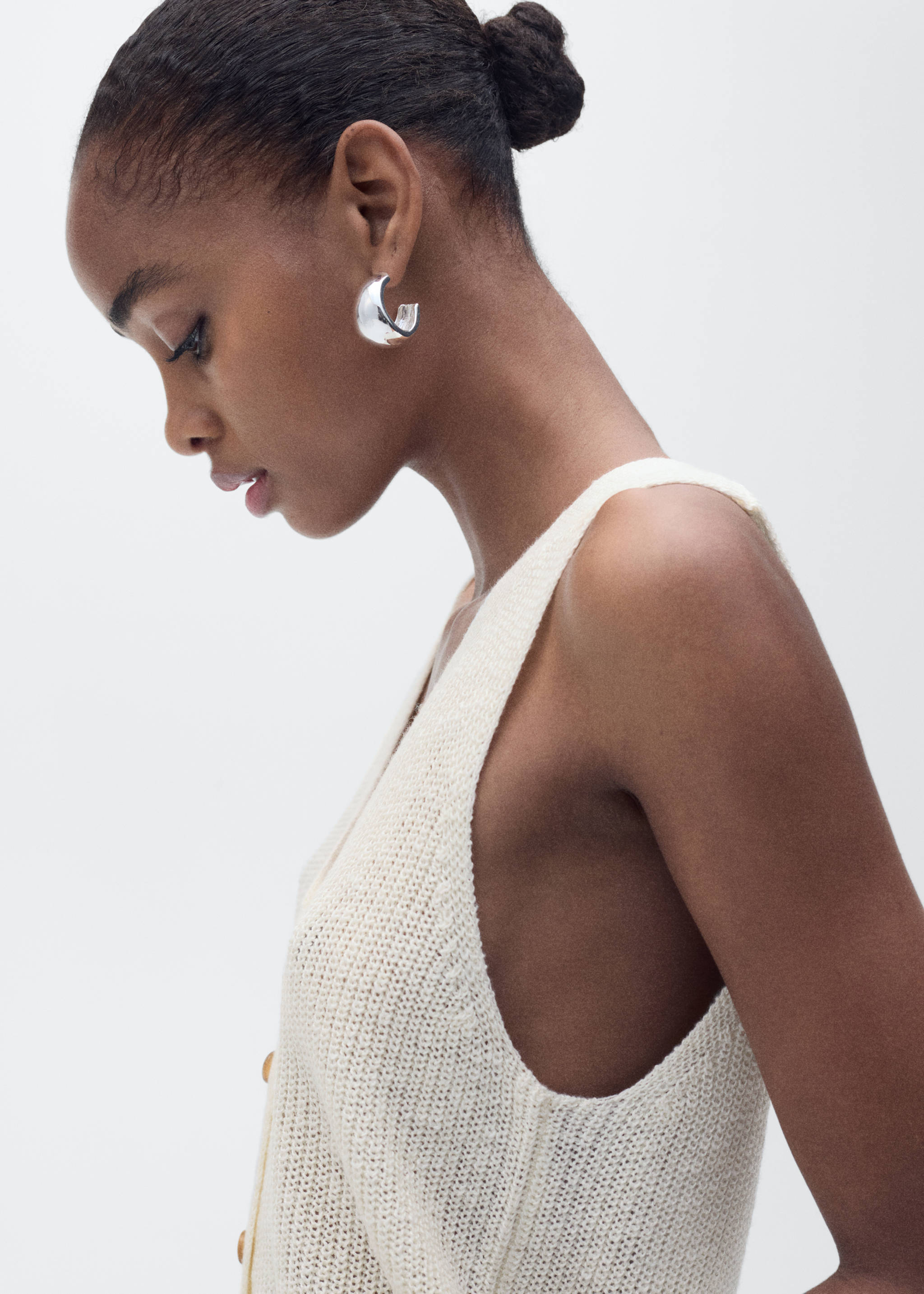 Grofgebreid gilet met knopen - Detail van het artikel 1