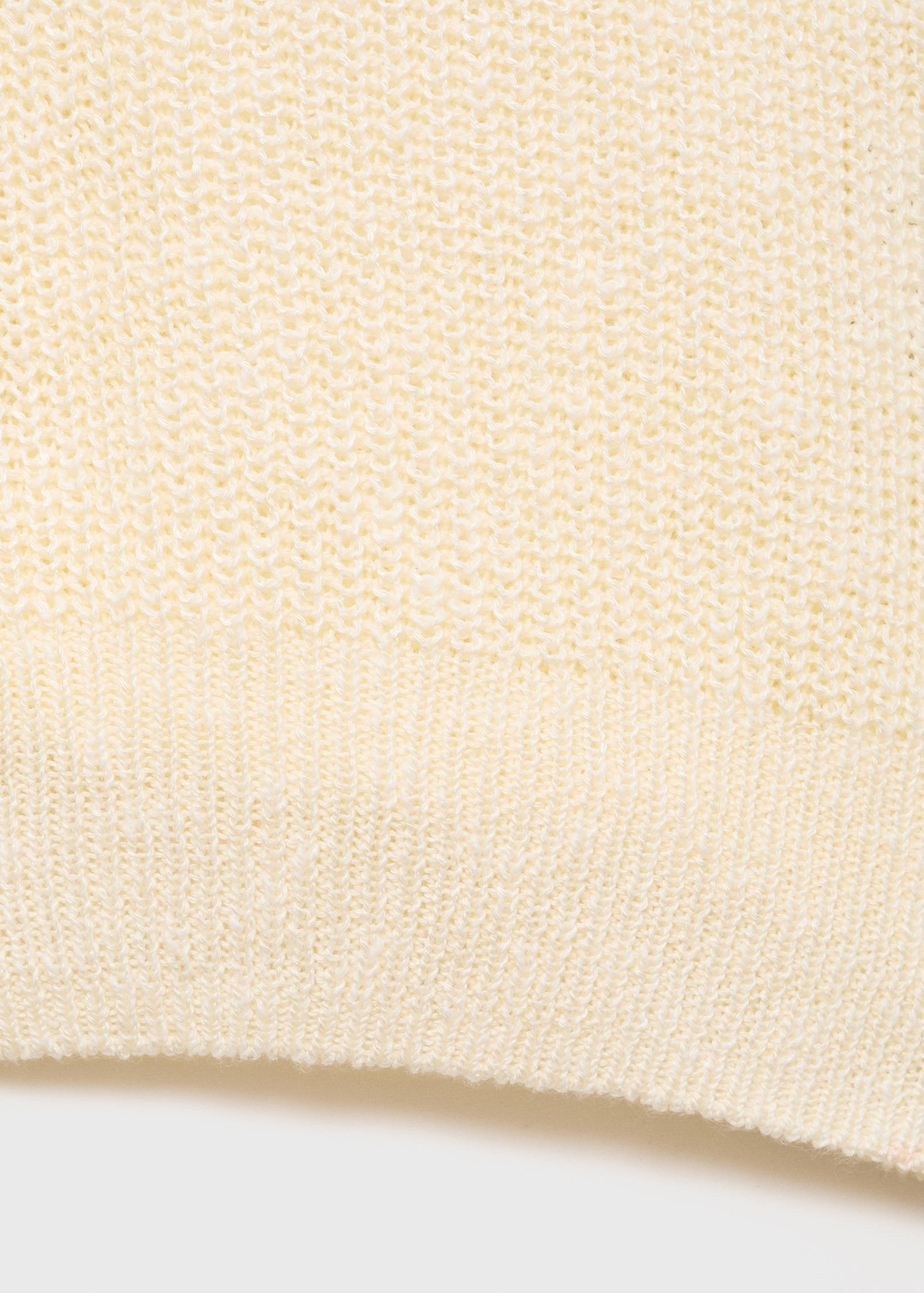 Grofgebreid gilet met knopen - Detail van het artikel 0