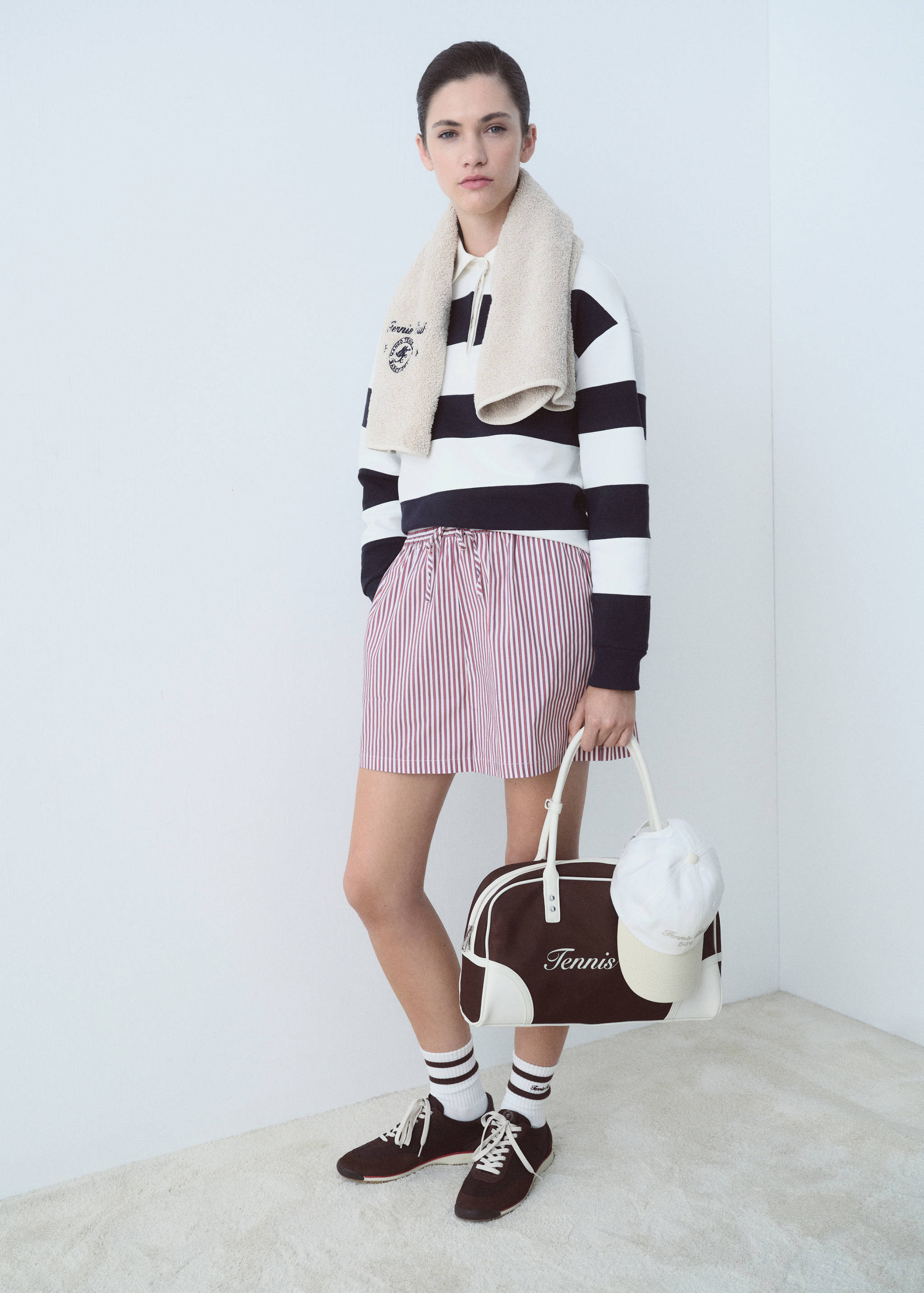 Striped polo shirt with embroidered message - General plane