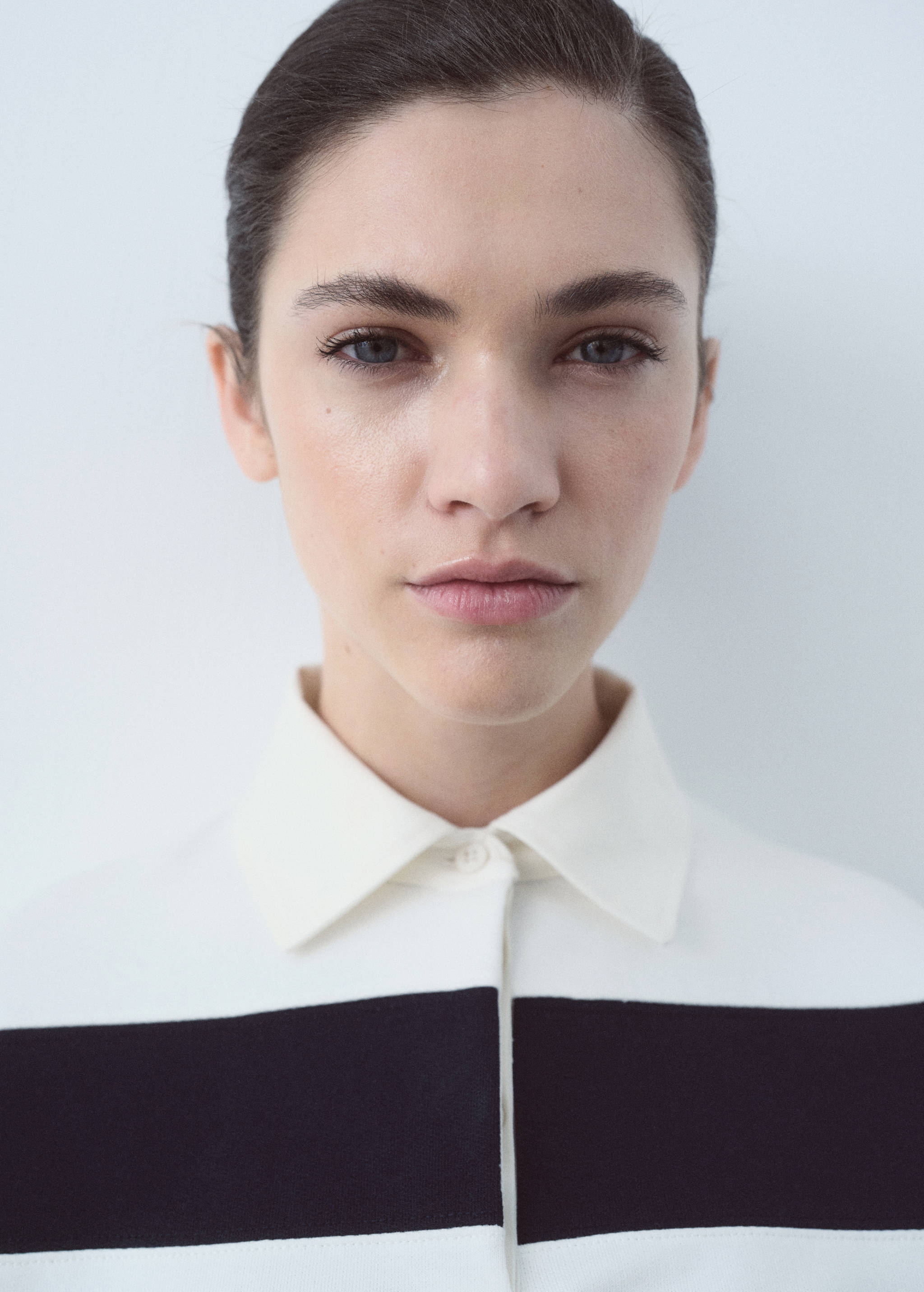 Striped polo shirt with embroidered message - Details of the article 2