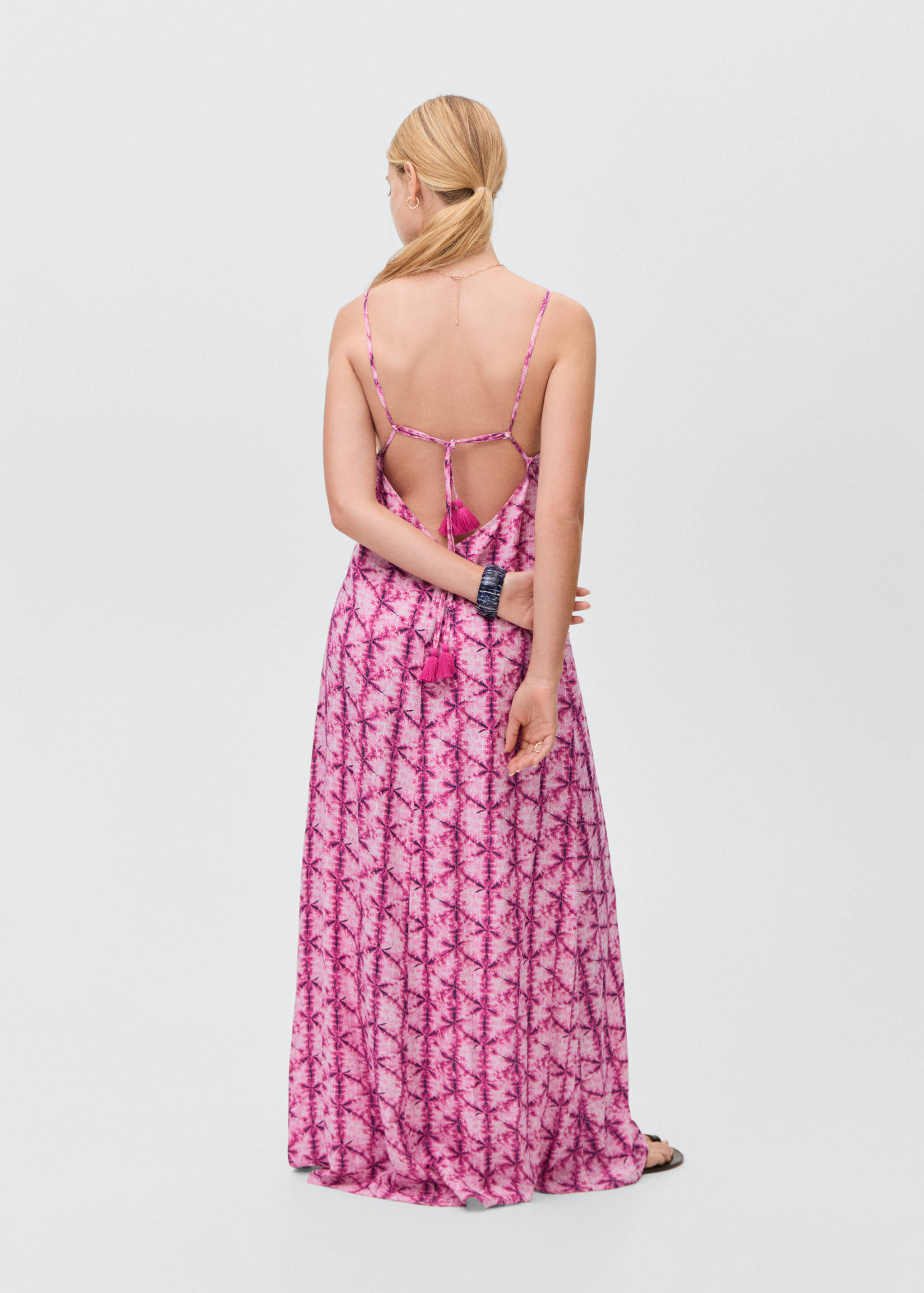 Long dress with open back - Reverse of the article