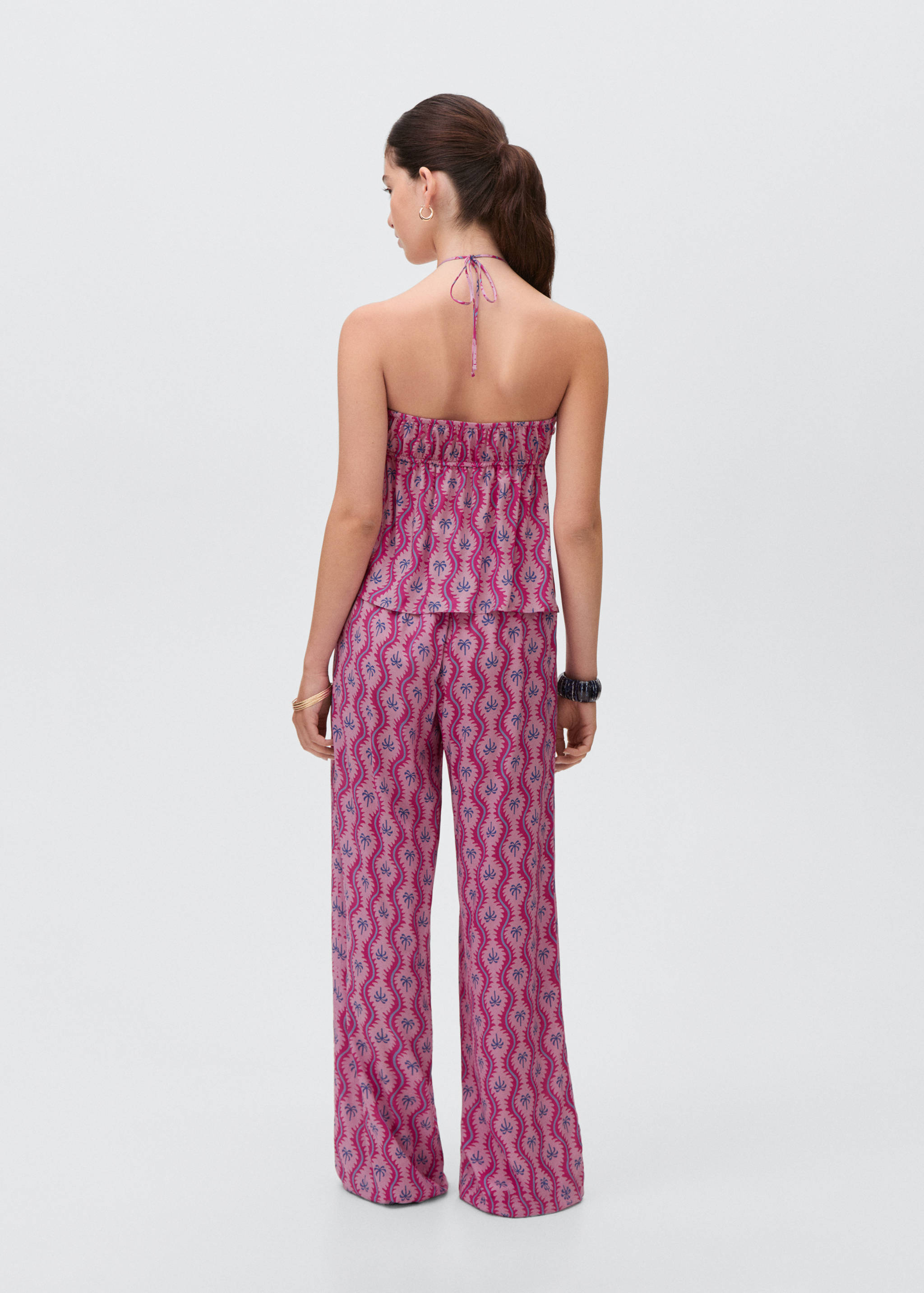 Palm tree printed trousers - Reverse of the article