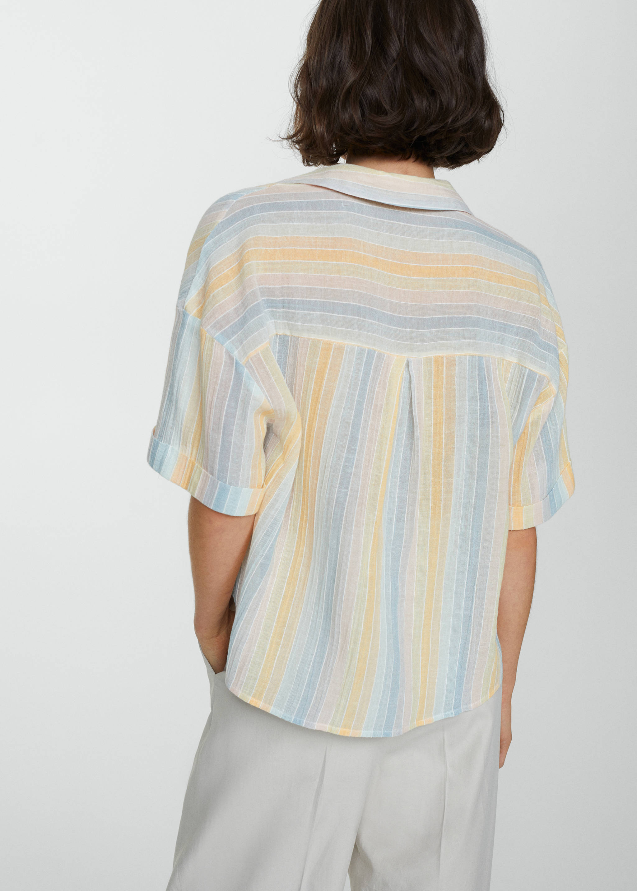 Semi-transparent striped shirt - Reverse of the article