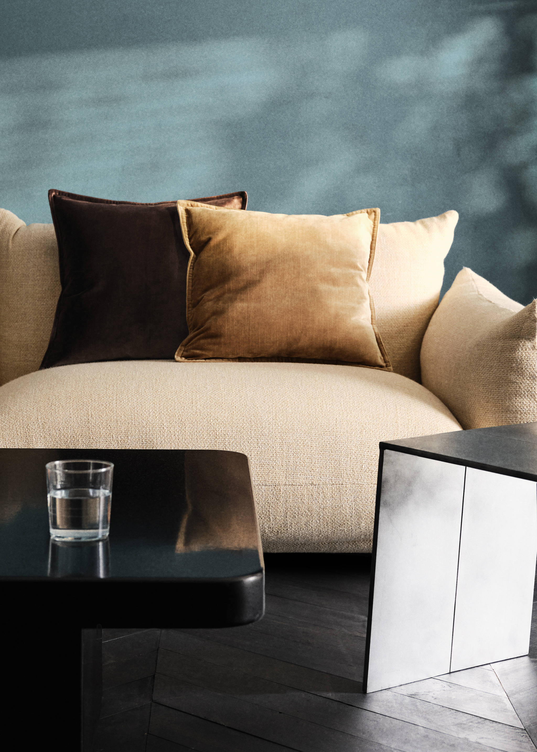 Combine cushions with beige sofa.