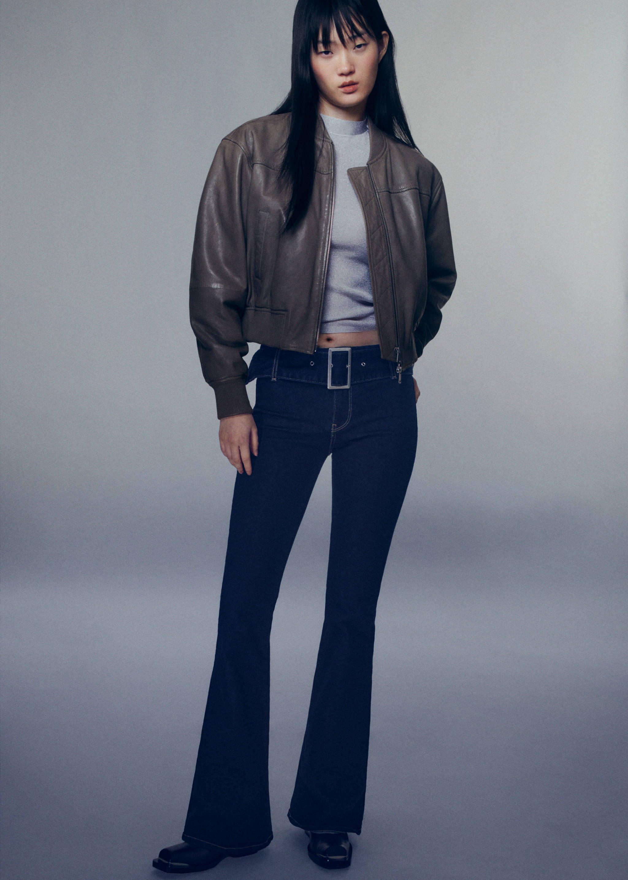Woman wearing flared jeans