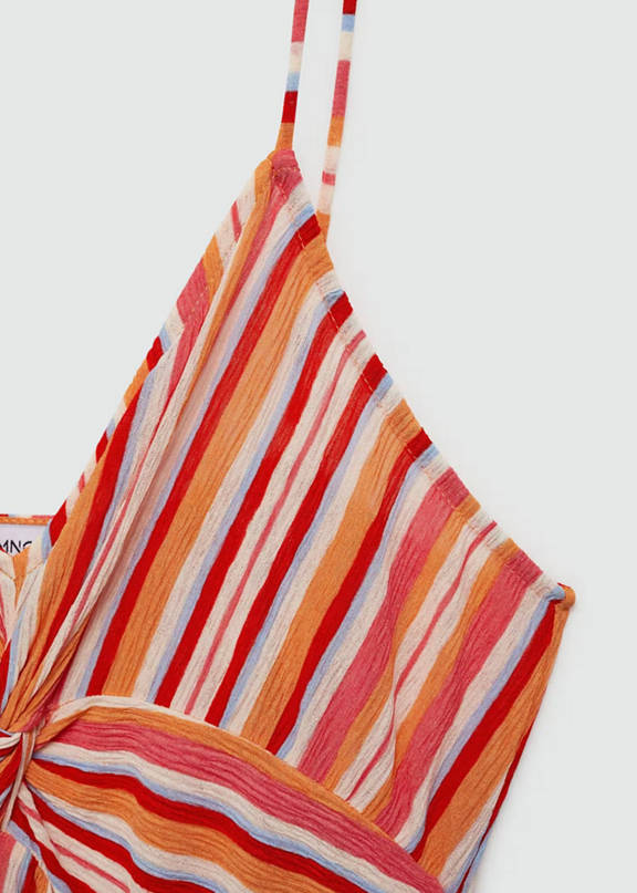 Beach look for women with a printed dress with colorful stripes.