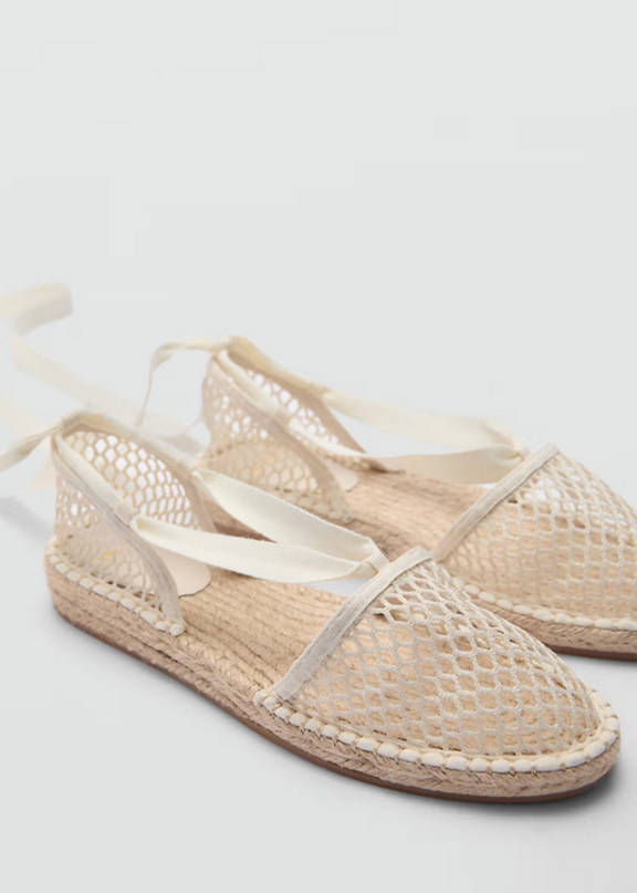 Outfit for summer travel with beige espadrilles.