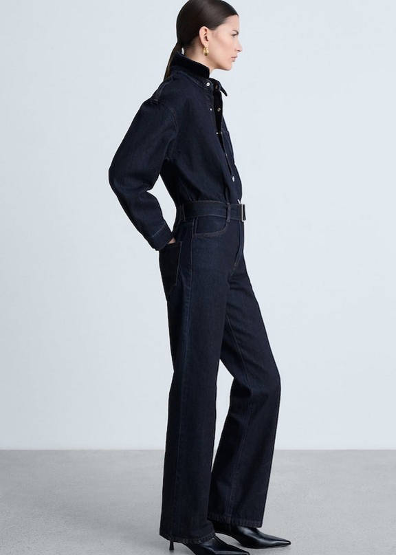 A woman wearing a denim total denim look