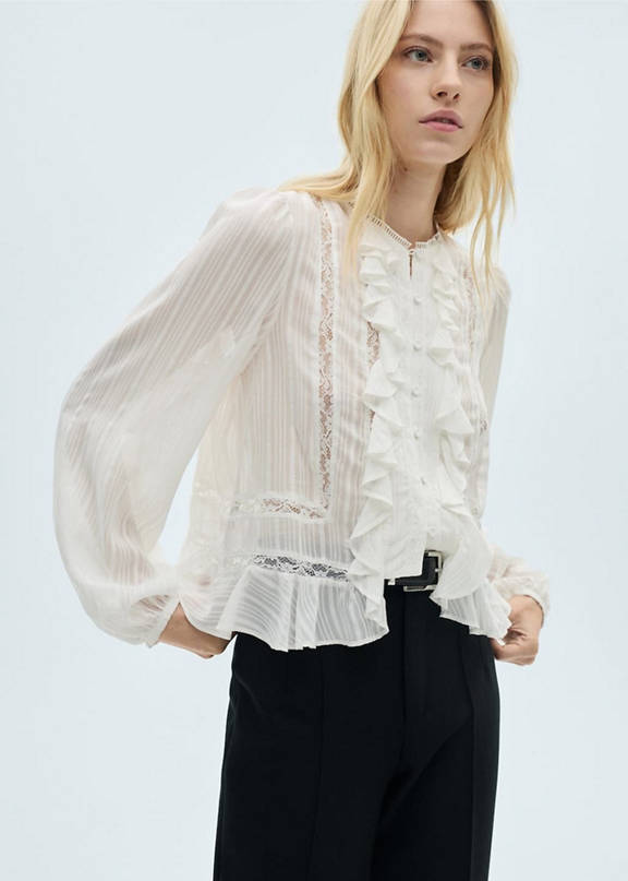 Woman wearing a white lace blouse