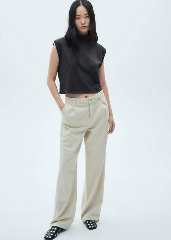 Woman wearing checkered straight pants