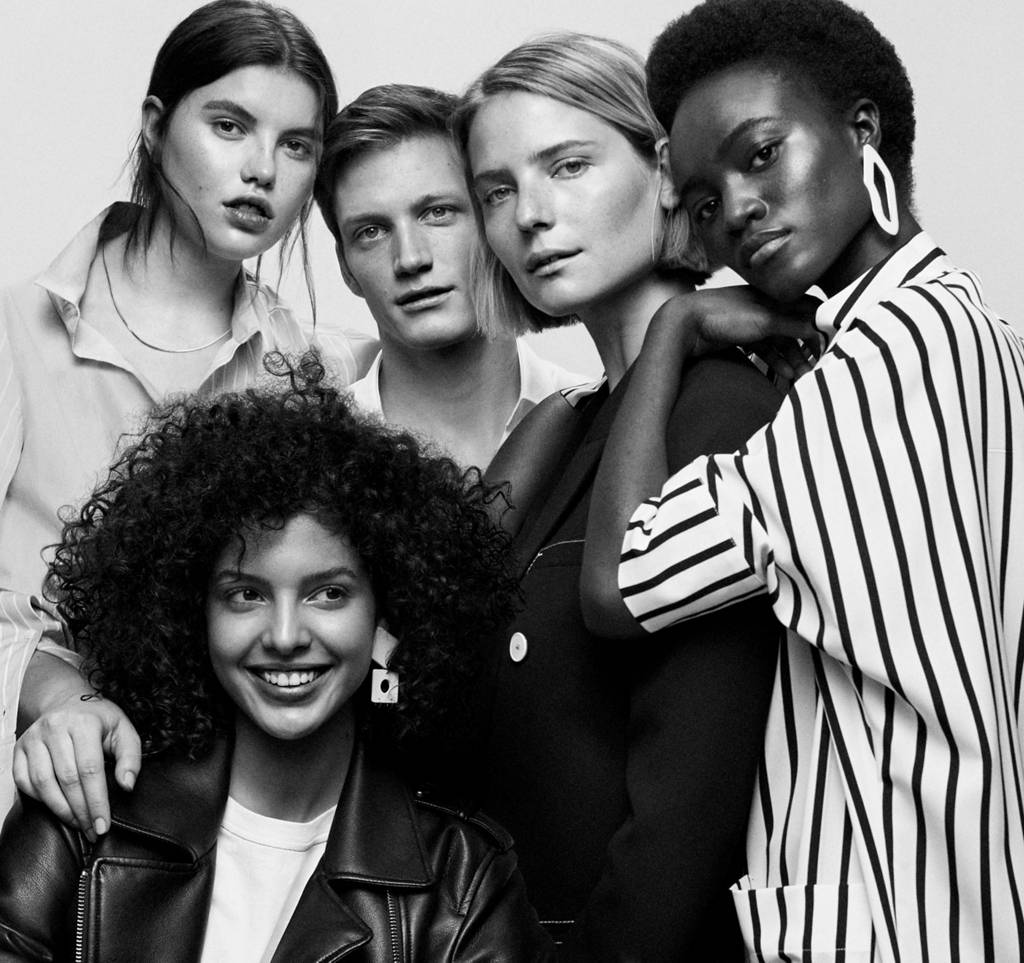 Group of diverse fashion models in black and white